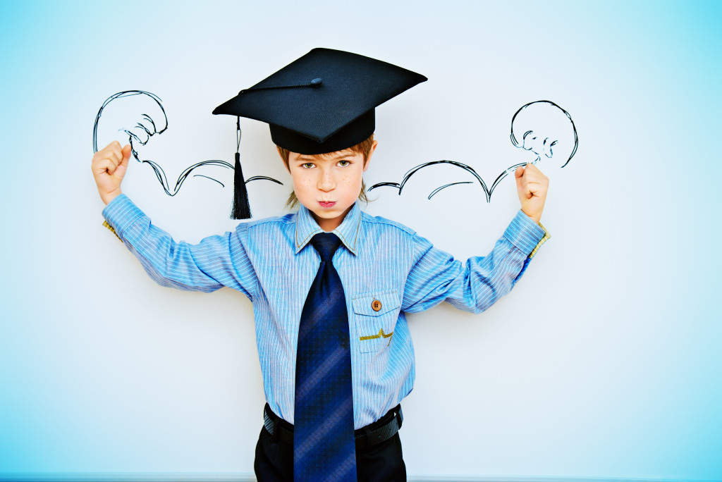 a child wearing graduation cap